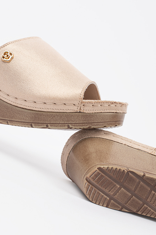 gold color slippers Inomens on a Inedge