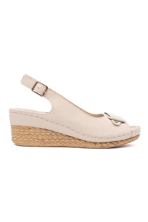 ivory sandals on a loIn Inedge