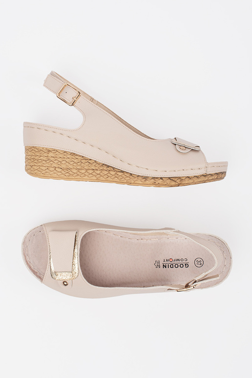 ivory sandals on a loIn Inedge