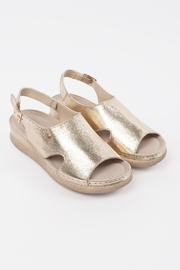 gold color flat sandals... 2
