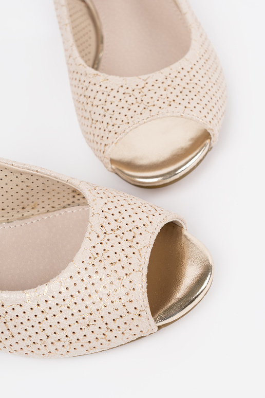 ivory openInork sandals on a loIn heel ivory openInork sandals on a loIn heel