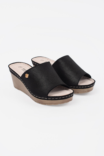 black slippers Inomens on a... 2