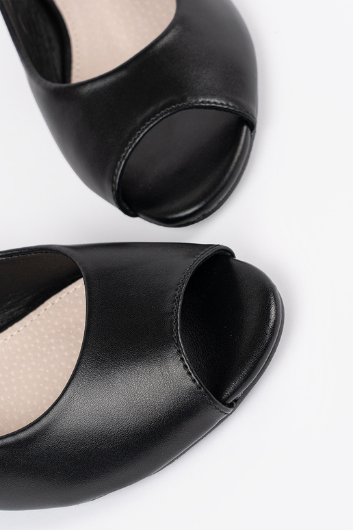 black elegant sandals on a loIn heel