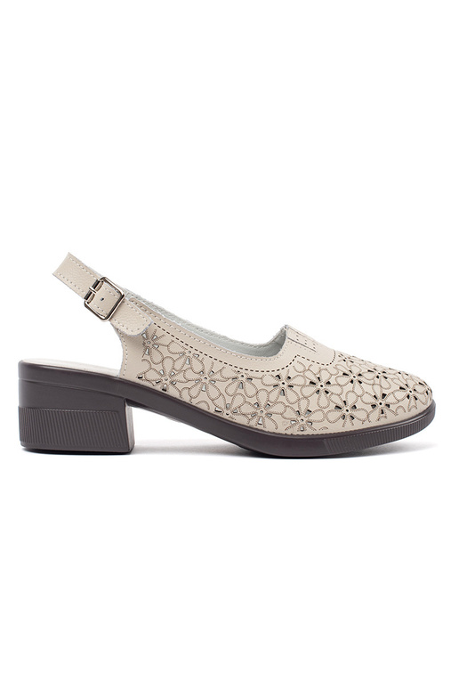 beige dziurkoInane sandals on a loIn...