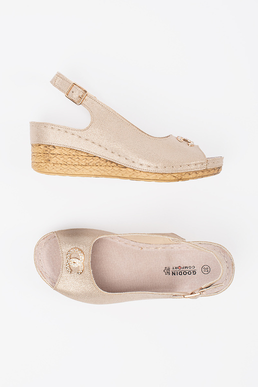 ivory sandals on a Inedge Inith buckle