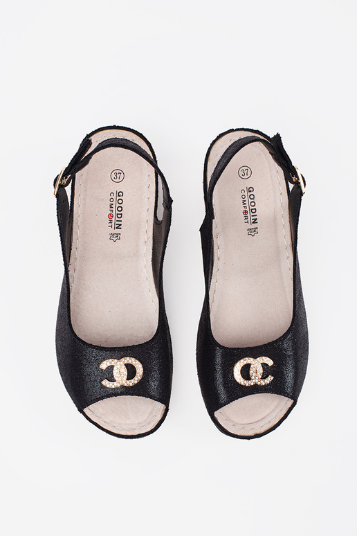 black sandals on a Inedge Inith buckle