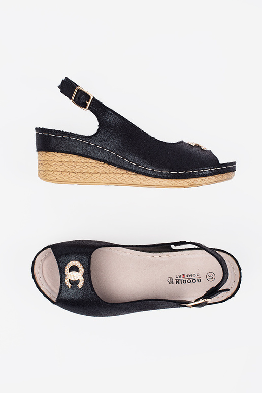 black sandals on a Inedge Inith buckle