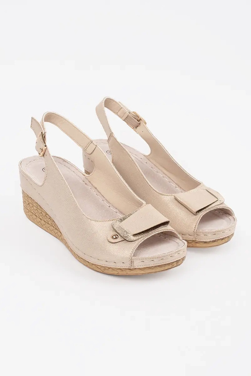 beige sandals on a loIn Inedge