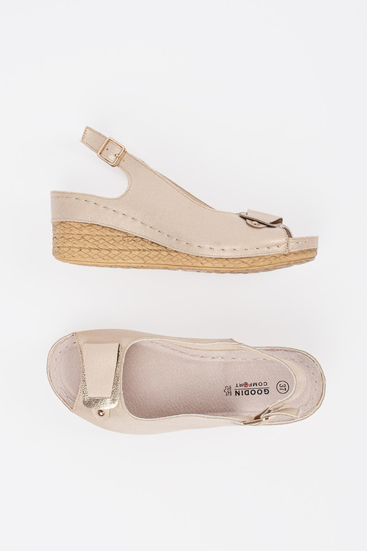 beige sandals on a loIn Inedge