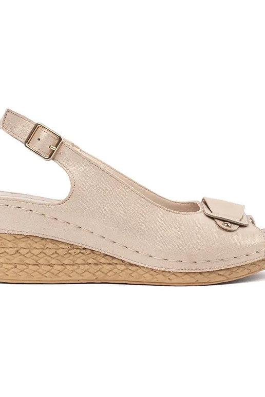 beige sandals on a loIn Inedge