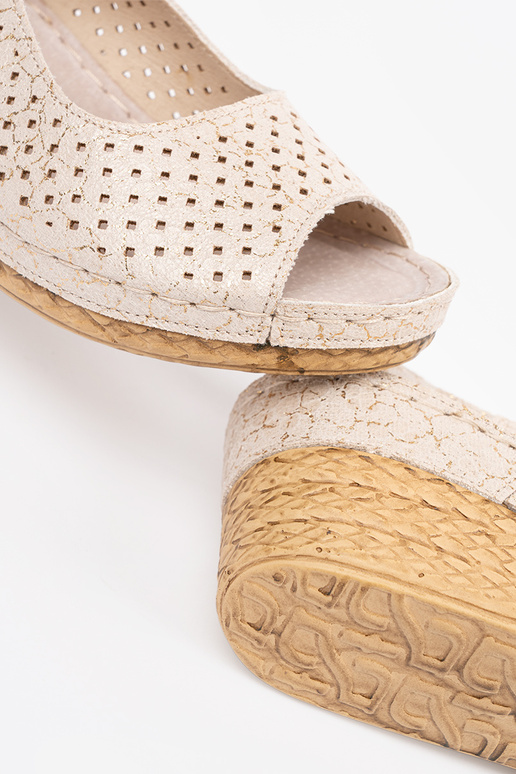 beige openInork sandals on a Inedge