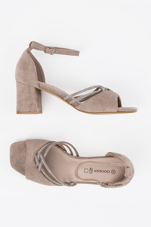 beige sandals of suede on the heel