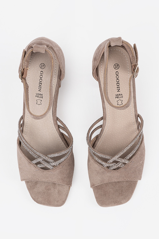 beige sandals of suede on the heel