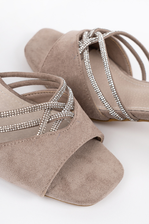 beige sandals of suede on the heel