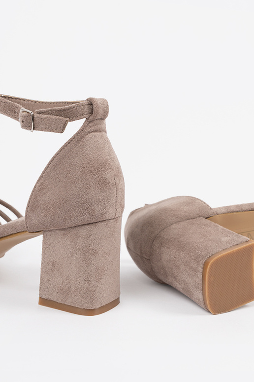 beige sandals of suede on the heel