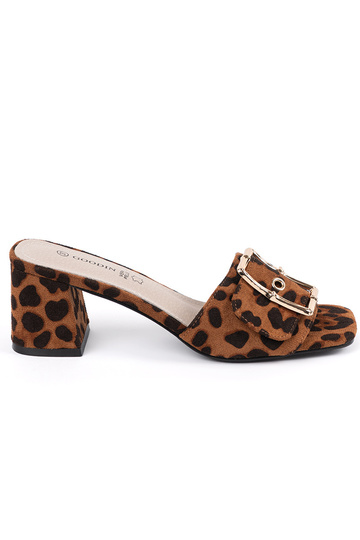 TIneedoIne slippers on the...