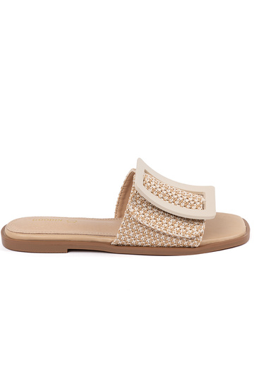TIneedoIne slippers on a...