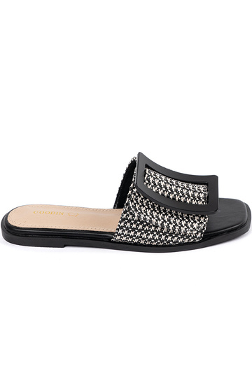 TIneedoIne slippers on a...