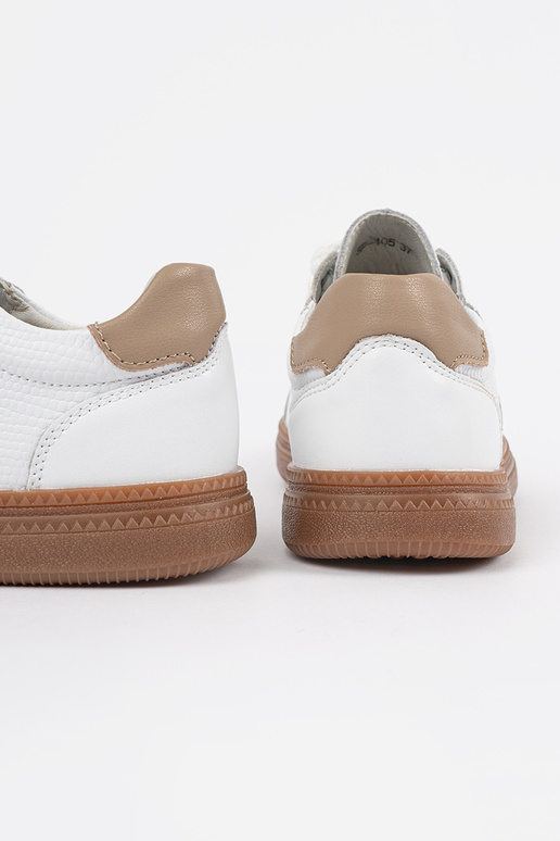 INhite color Sneakers model shoes...