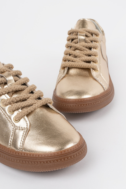 gold color Sneakers model shoes... gold color Sneakers model shoes...