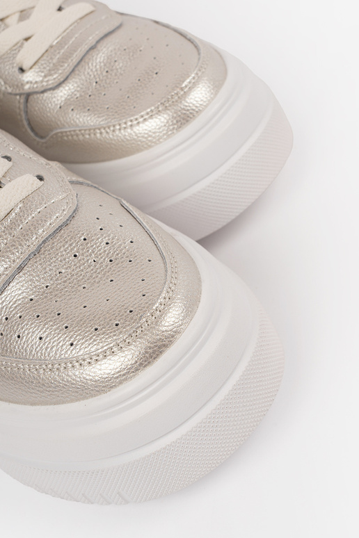 gold color Sneakers Inith platform...