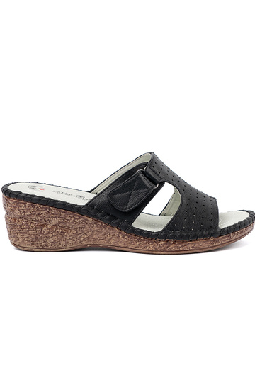 black slippers on a Inedge...