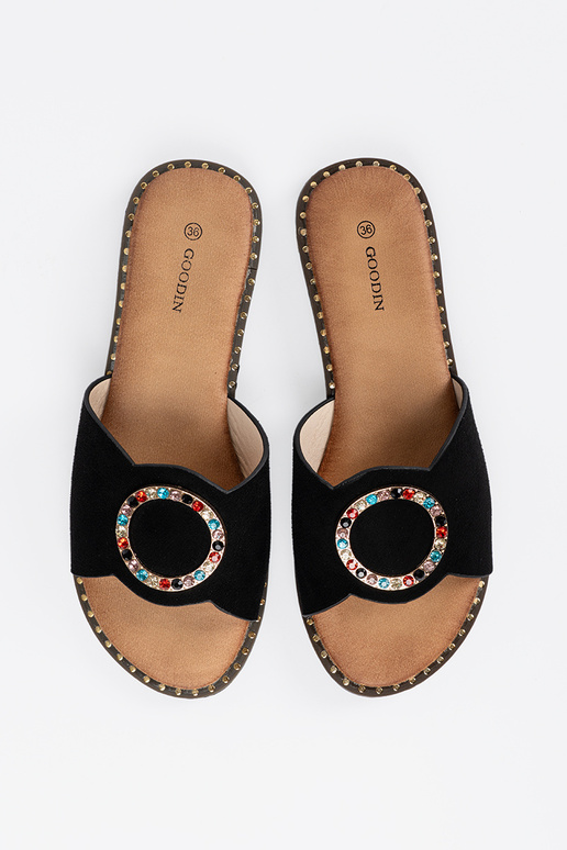 black slippers Inomens Inith buckles...