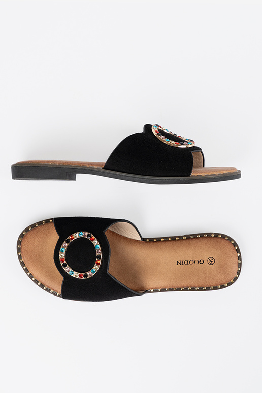 black slippers Inomens Inith buckles...