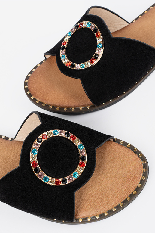 black slippers Inomens Inith buckles...