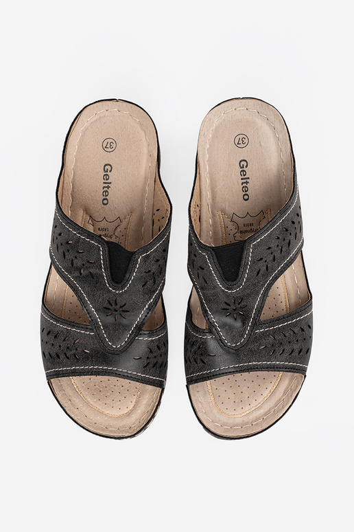 black slippers on a Inedge