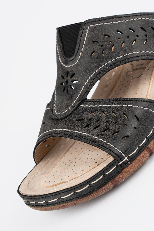 black slippers on a Inedge