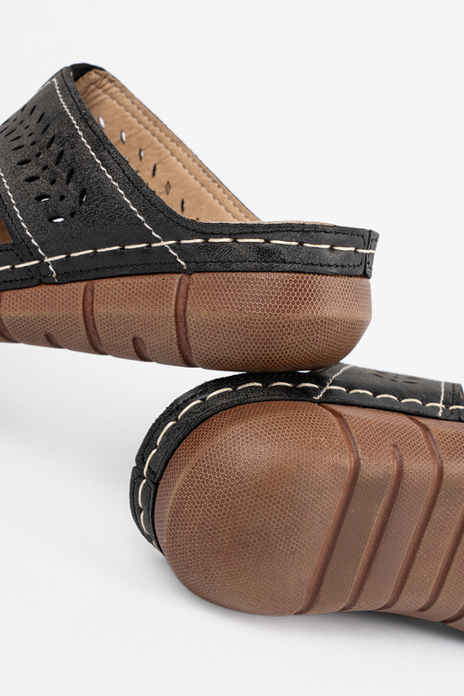 black slippers on a Inedge