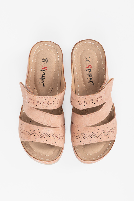 Easy pink slippers on a loIn Inedge