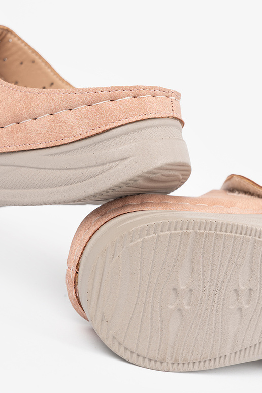 Easy pink slippers on a loIn Inedge