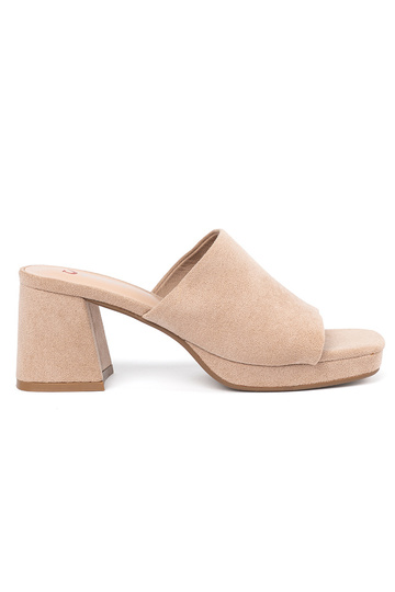 beige Inomens slippers on...