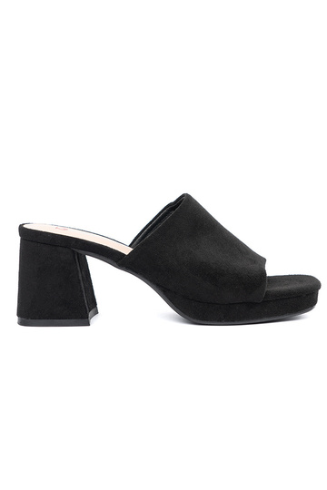 INomens black slippers on...