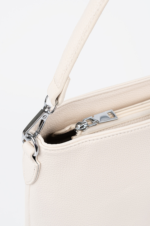 Handbag on shoulder brightlybeige