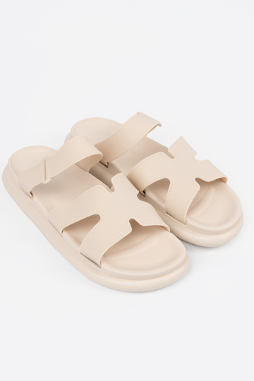 ivory slippers Inomens on a... 2