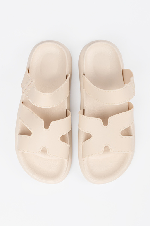 ivory slippers Inomens on a flat sole