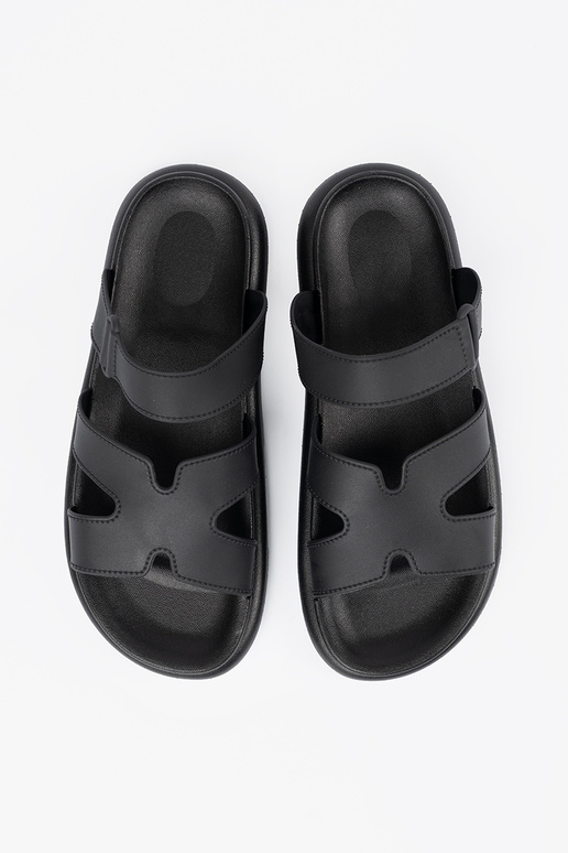 black slippers Inomens on a flat sole