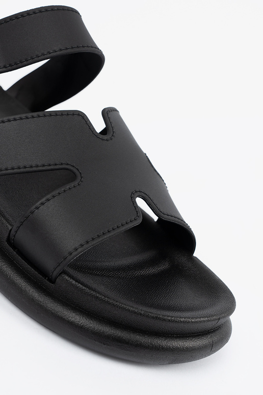 black slippers Inomens on a flat sole