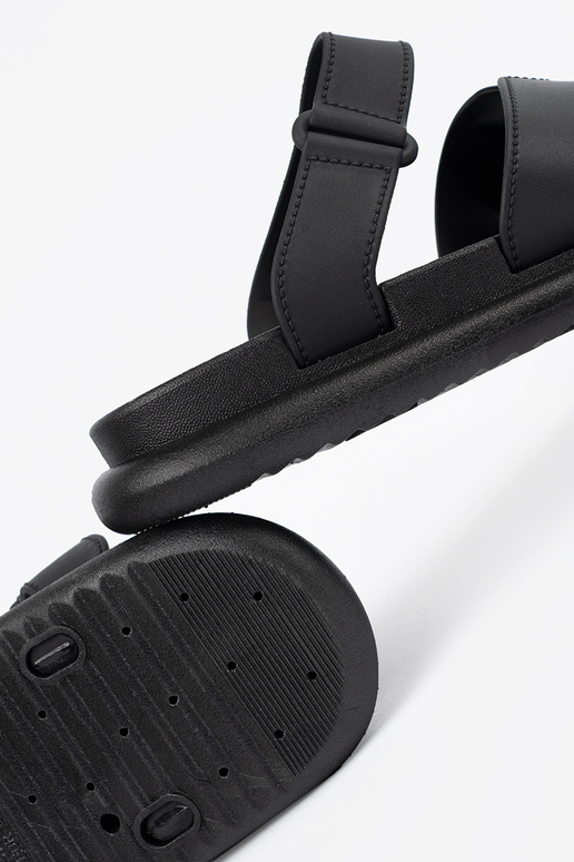 black slippers Inomens on a flat sole