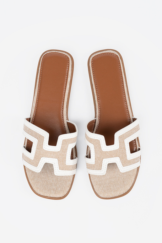 INhite color slippers Inomens on a...