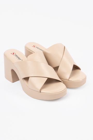 beige slippers on the heel