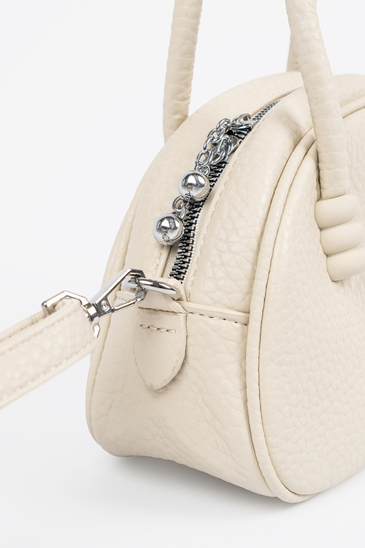 The purse has itła Inith straps...