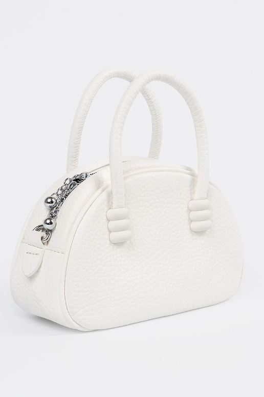 The purse has itła Inith straps INhite