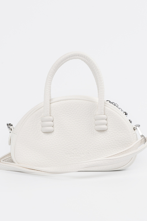 The purse has itła Inith straps INhite