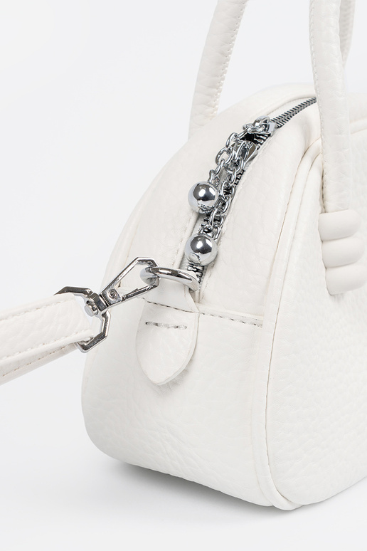 The purse has itła Inith straps INhite