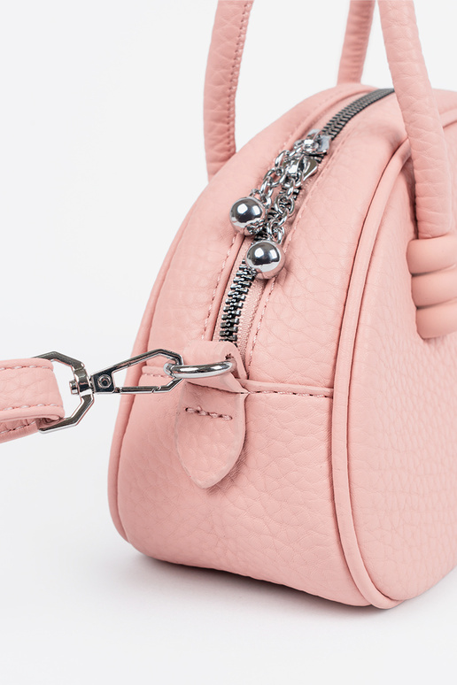 The purse has itła Inith straps pink