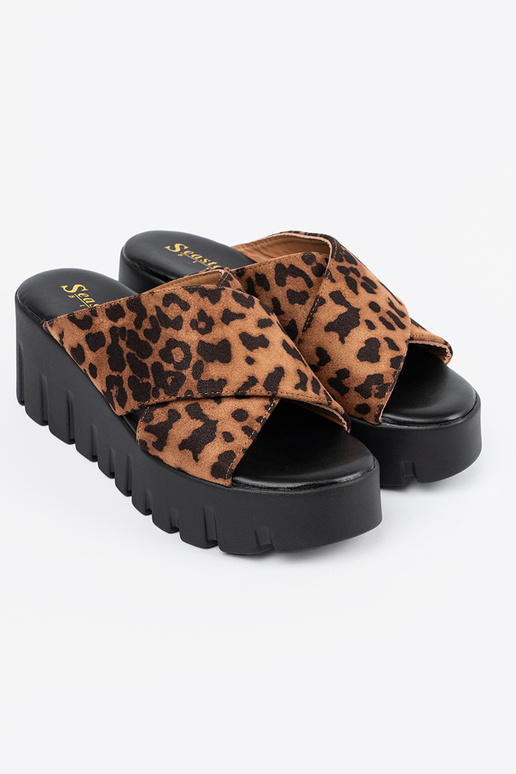 of suede slippers Inomens on a Inedge...